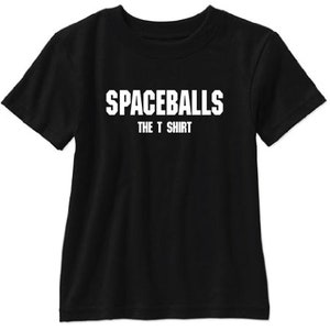 May include: Black t-shirt with white text that reads "Spaceballs The T Shirt"