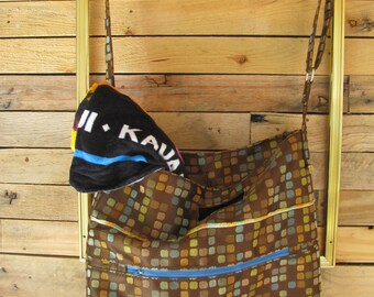 Greatest Purse/Messenger Bag Tote. Adjustable strap, inside key clip, front pocket, unique salvage edges added trim,One of a kind