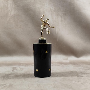Plastic cigarette box dispenser with vintage football player decor Made in France