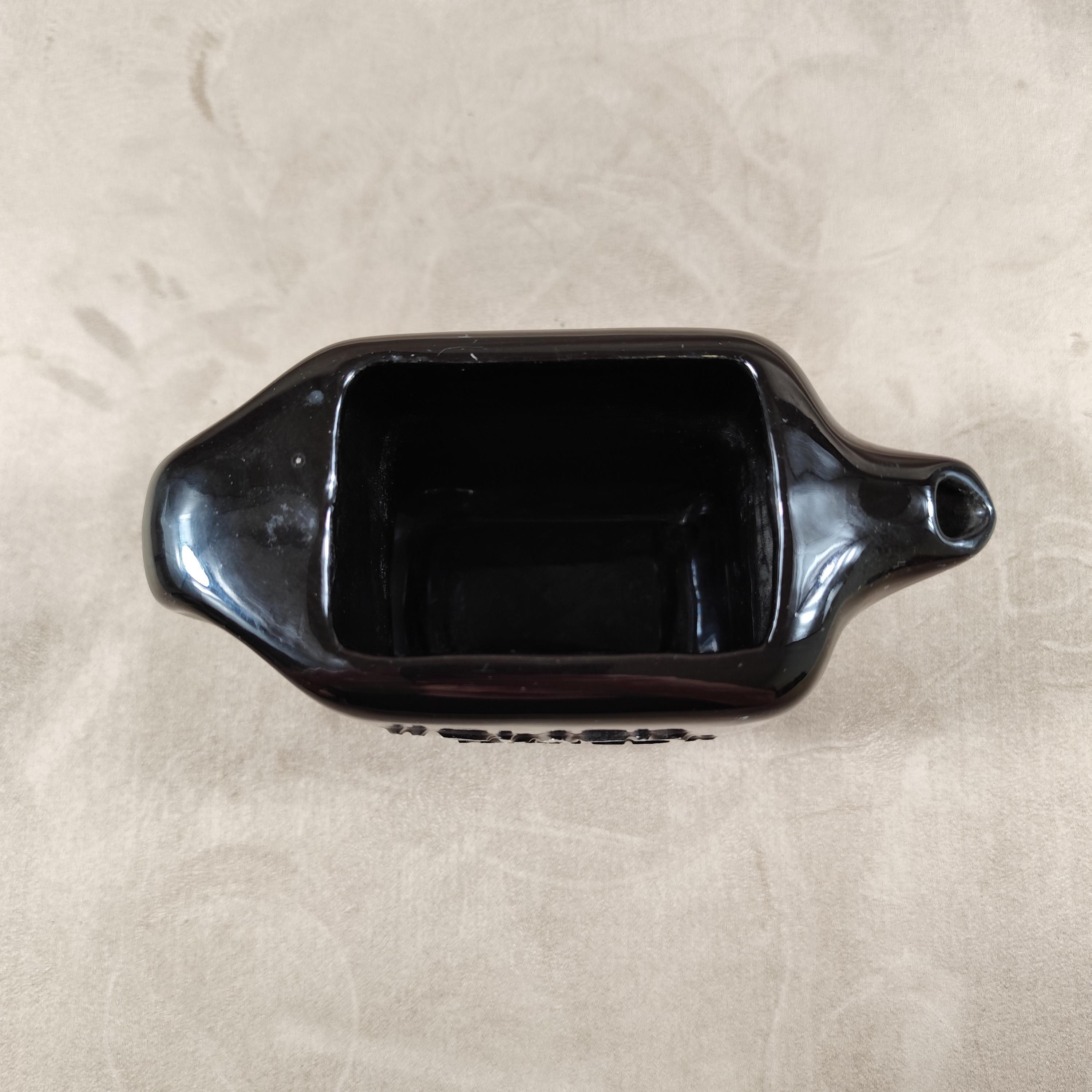 Cruche de pub traditionnelle de whisky écossais en bouteille