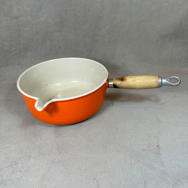 Pot with vintage spout Le Creuset orange enamelled cast iron and wooden handle Vintage made in France 1970
