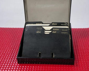 Plastic phonebook with cardboards sheets with smoked grey cover Vintage 1970