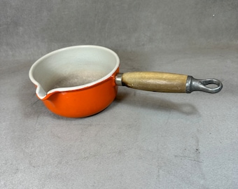 Pot with vintage spout Le Creuset orange enamelled cast iron and wooden handle Vintage made in France 1970