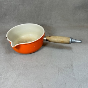 Pot with vintage spout Le Creuset orange enamelled cast iron and wooden handle Vintage made in France 1970