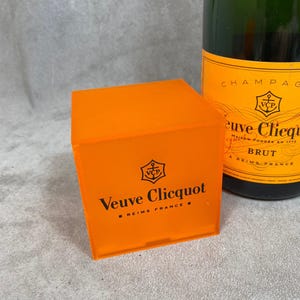 Veuve Clicquot Ponsardin&#39;s lighter cube in orange plastic Circa 1990