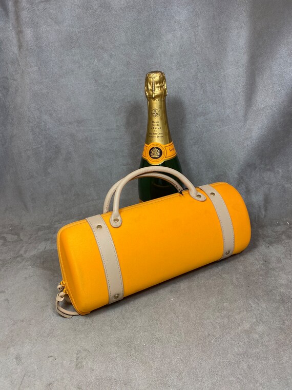 Champagne in clearance orange bag