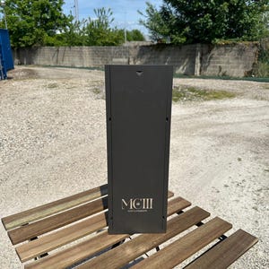May include: A black box with the text "MCIII MOET & CHANDON" printed on the front.