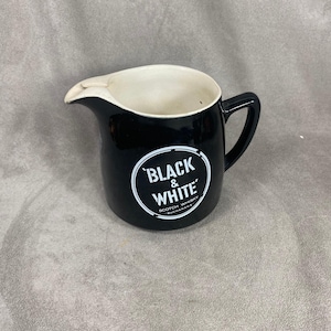 Brocca pubblicitaria in ceramica nera e bianca, realizzata in Inghilterra, vintage 1980