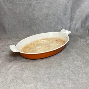 Dish in orange cast iron Le Creuset Cousance  vintage Made in France 1980’s