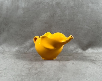 Beautiful orange ceramic teapot in the shape of an elephant Made in France