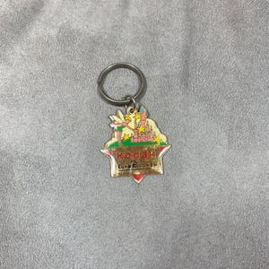 Kodak key ring for Euro Disney in metal Made in France 1960’s