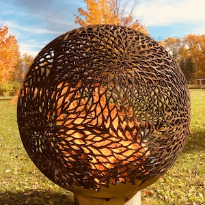 DAHLIA FLOWER POWER Fireball Fire Pit bursting eith intricate blossoms. See our fire pit art in our fire pit gallery at fireballfirepits.com