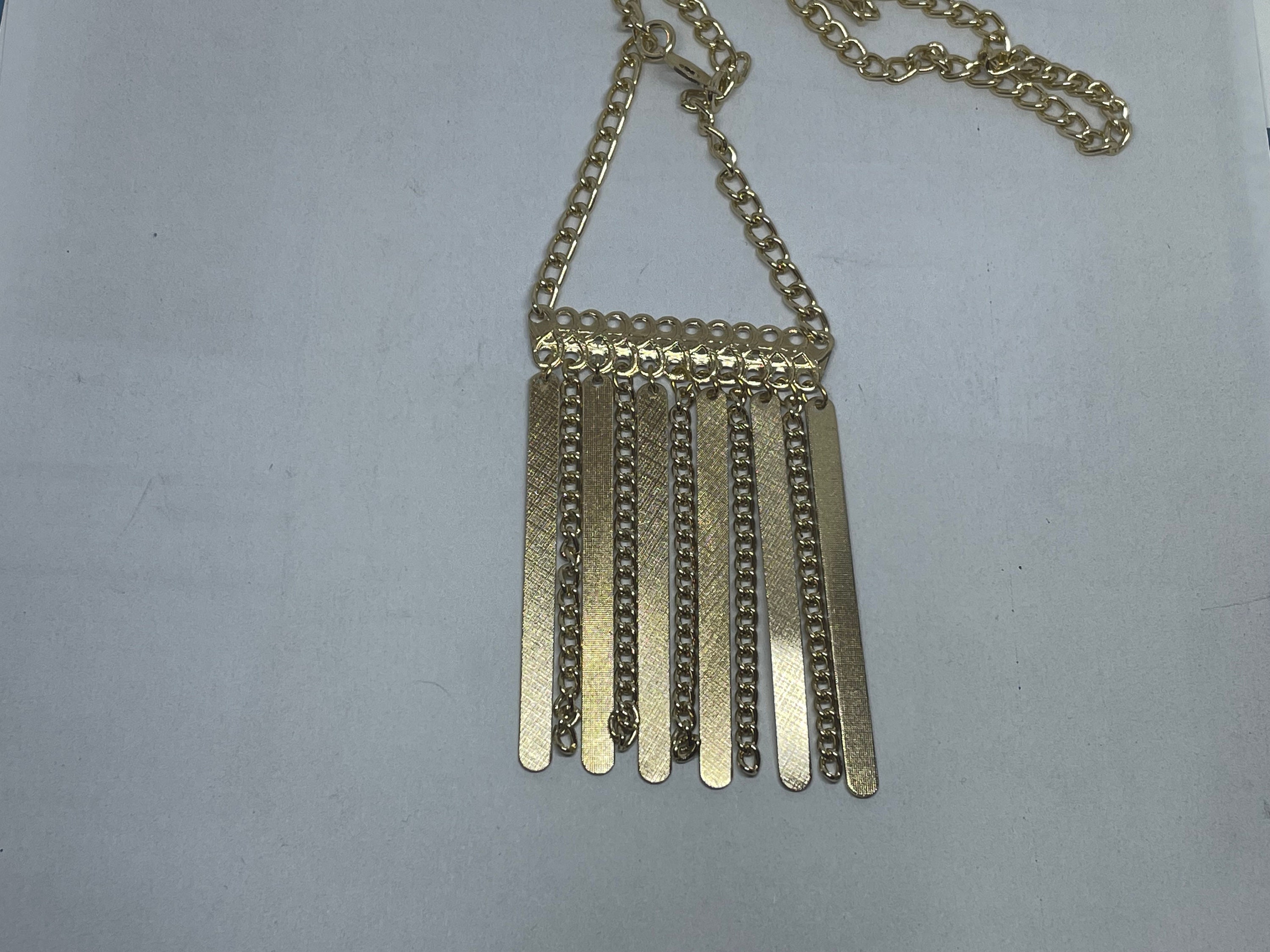 1970's Fringed pendant gilt on 30 inch chain