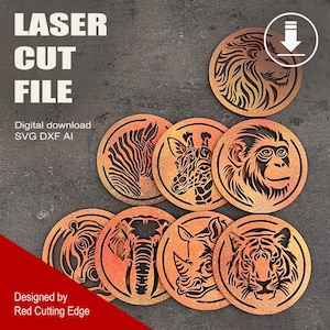 May include: Set of eight laser cut wooden coasters featuring animal head silhouettes. The coasters are in shades of orange and brown with black outlines. The animals include a lion, zebra, giraffe, monkey, elephant, rhinoceros, tiger, and hippopotamus.