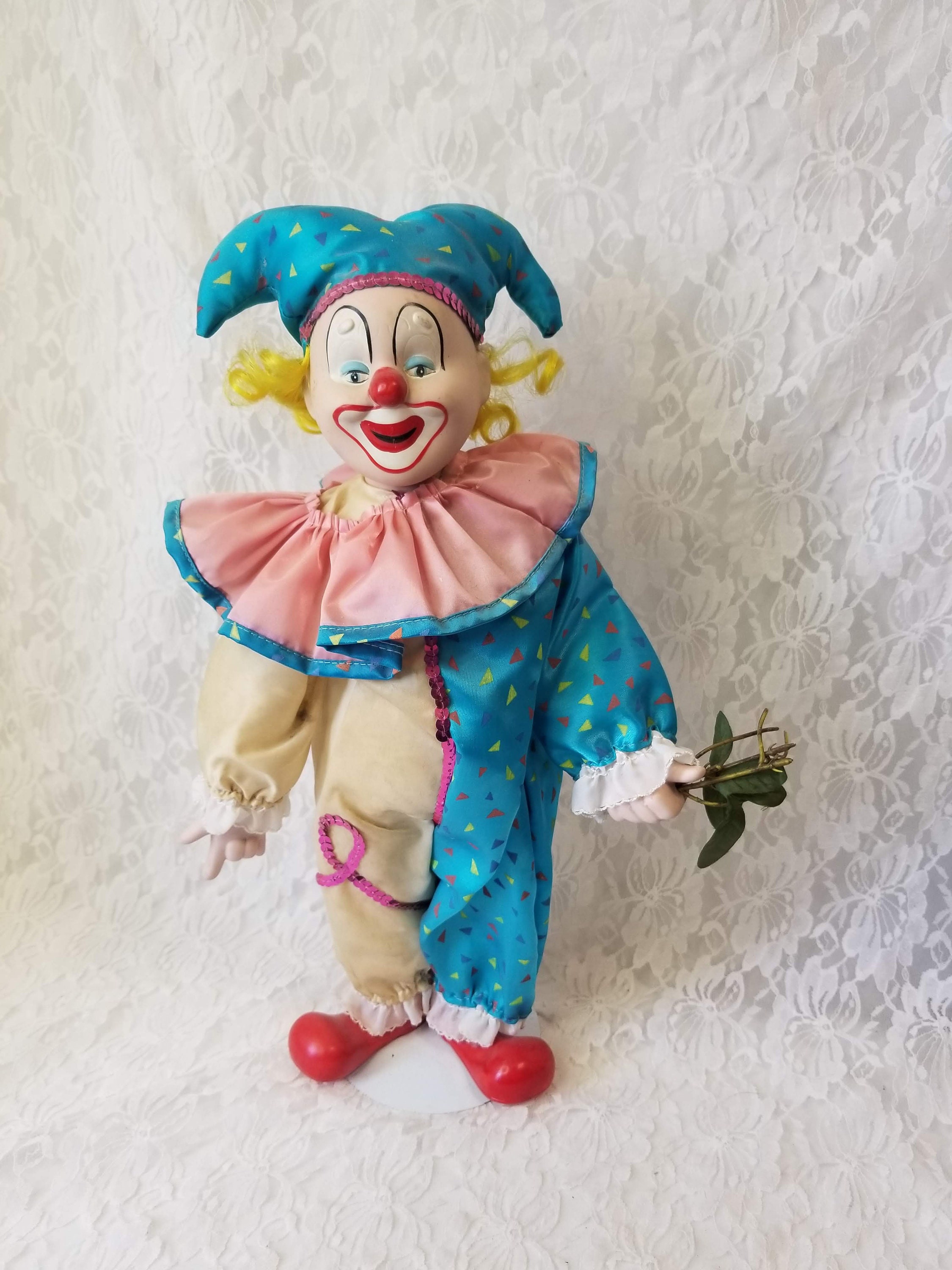 sad clown porcelain doll