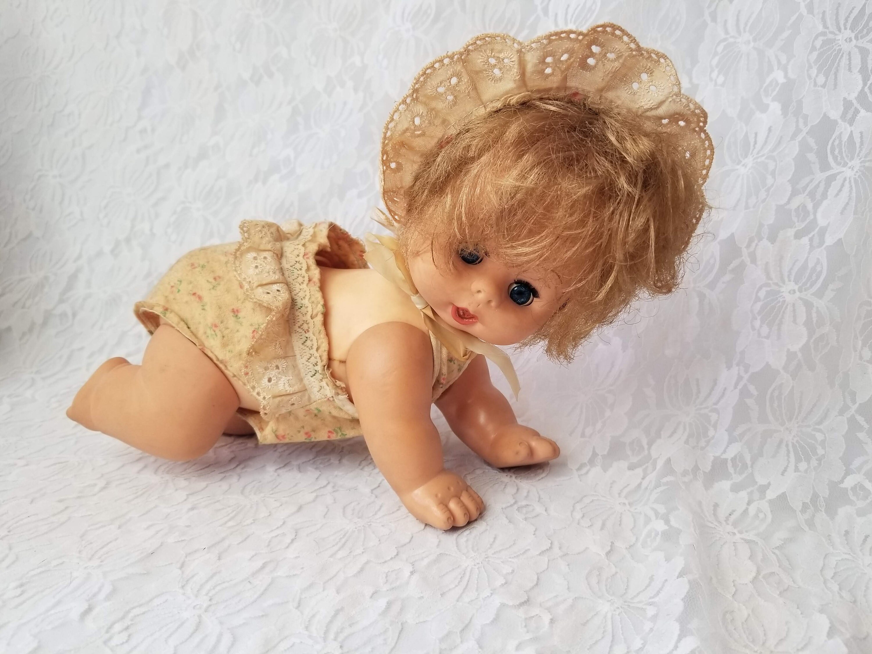 creepy crawling doll