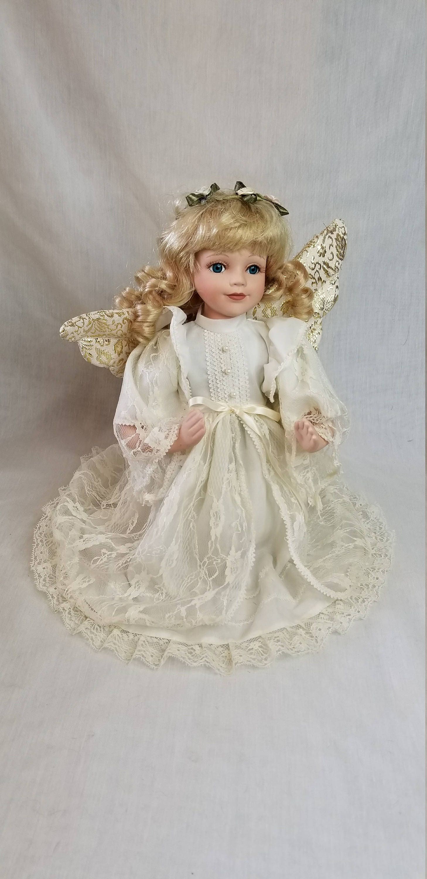 porcelain praying angel doll