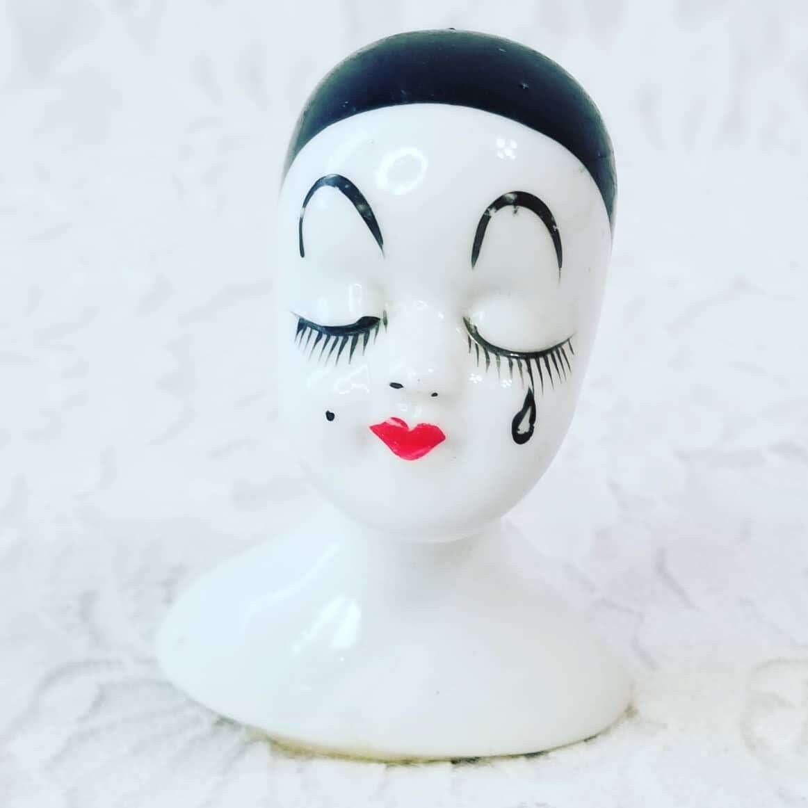 porcelain mime doll