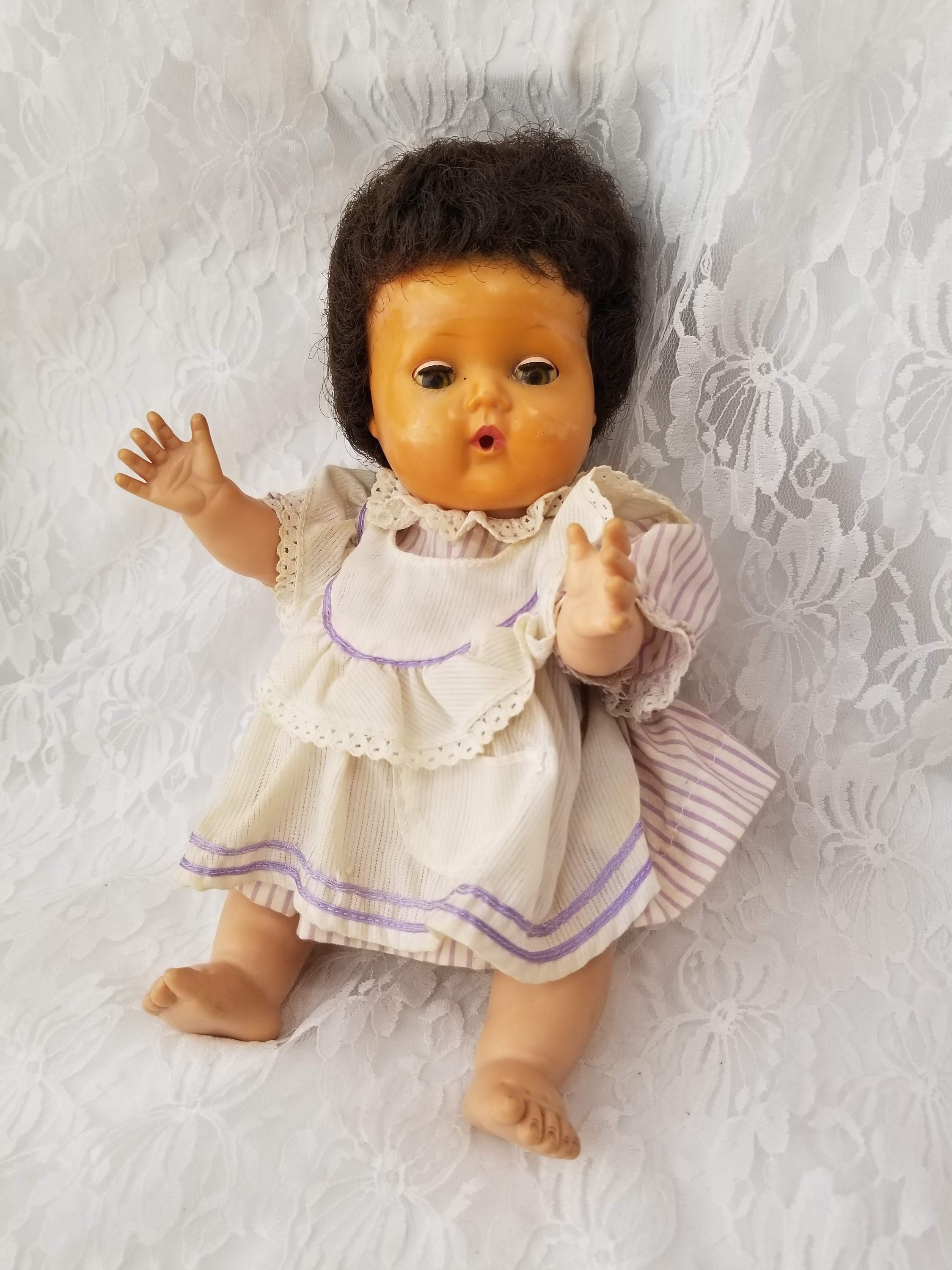 black tiny tears doll