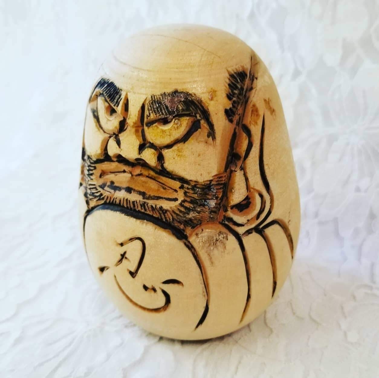 wooden daruma doll