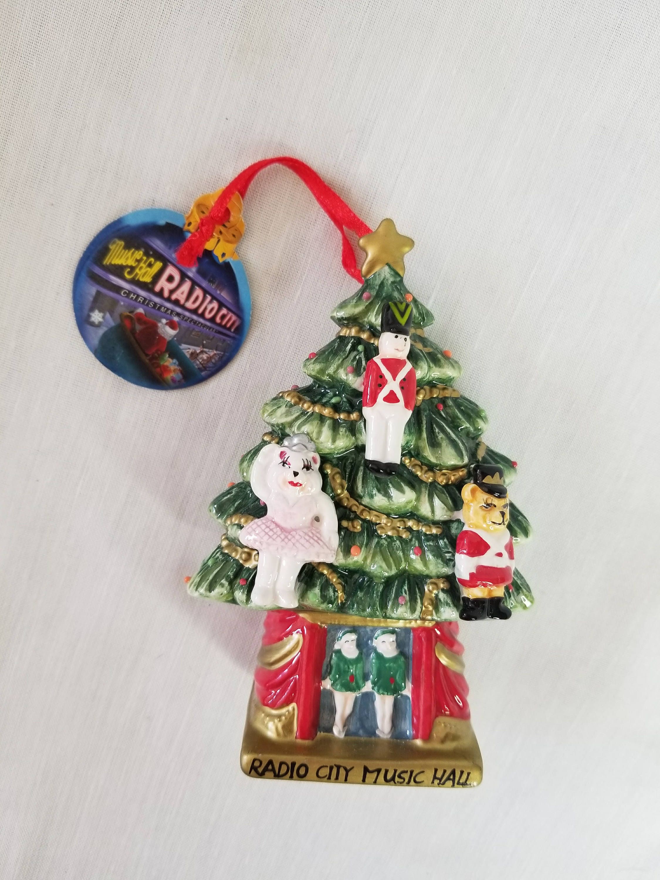 Radio City Music Hall Christmas Tree Porcelain Ornament Figurine 5 by 3 Original Tag From