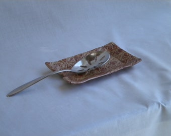 Brown toned stoneware doily spoon rest