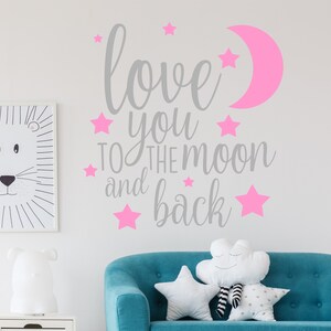 May include: A gray and pink wall decal with the text "love you to the moon and back" surrounded by pink stars and a pink crescent moon.