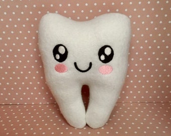 stuffed animal with baby teeth