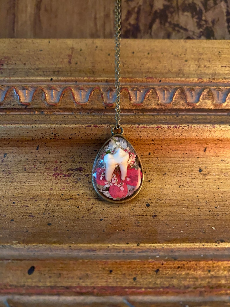 Floral Raccoon Tooth Tear Drop Pendant