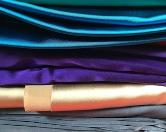 Stretch Satin fabric sold by coupon, Reflects light wonderfully. Ideal for dresses, lingerie, skirts and tight tops.