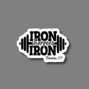 May include: Black and white sticker with a dumbbell and the text "IRON sharpens IRON Proverbs 27:17"