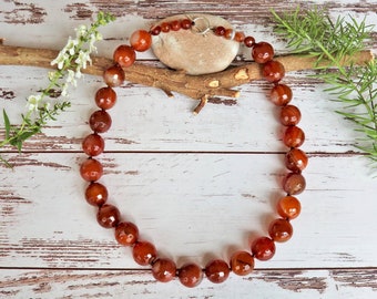 Faceted Carnelian Dyed and heat treated hand knotted short necklace.