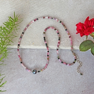 Beaded watermelon tourmaline cultured pearl pendant necklace. a single pearl centered in a genuine faceted tourmaline collar necklace.