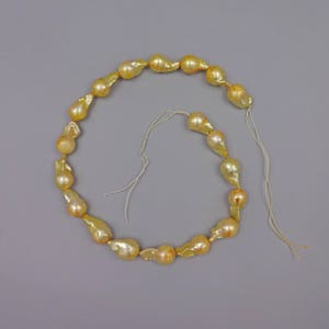 Natural Nucleated Baroque Cultured Freshwater Pearl, Flame ball  11-12mm of Diameter Full Strand