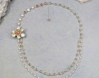 Pearl and crystal multi strand necklace. Shimmering pearl and sparkly crystal necklace.Pearl Blossom Cascade Necklace.