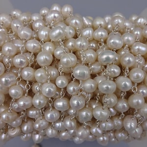 2ft.7-8mm potato shaped cultured fresh water pearl beaded chain in silver. wire wrapping pearl chain. non tarnish wire in silver color.