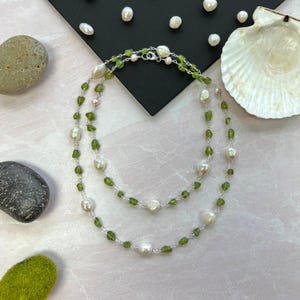 Beautiful peridot and white cultured pearl station necklace.  green and white gemstone long necklace. multi strand beaded wire necklace.