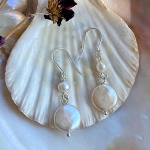 Cultured freshwater pearl drop earring. elegant coin pearl drop earring. pearl dangle earing sterling silver earring wire.