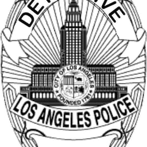 May include: Black and white illustration of a Los Angeles Police Department detective badge. The badge features a stylised image of the City Hall building with the words "DETECTIVE" and "LOS ANGELES POLICE" on a banner.