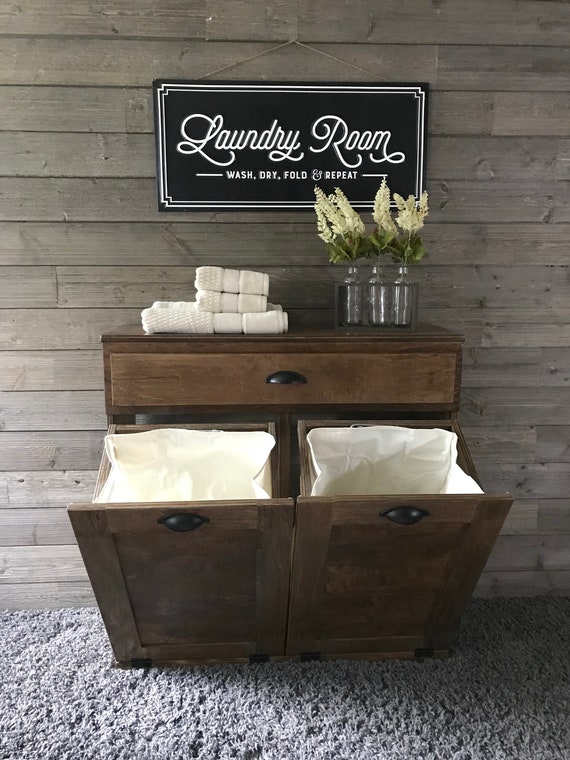 wooden laundry hamper on wheels