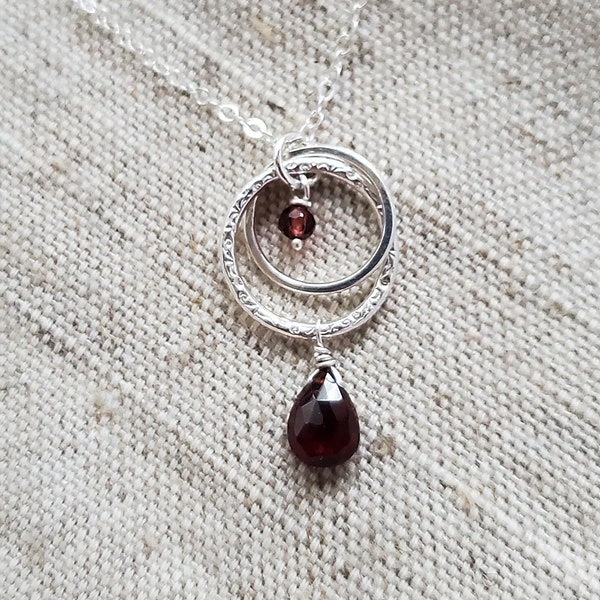 Love Eternal Necklace - Mother Daughter Garnets, Two Locked Rings representing Parent-Child Bond, Hammered and Textured Sterling Silver