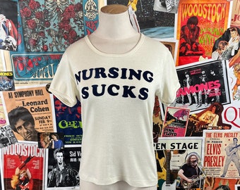 Vintage Women's 70s Funny Nursing Sucks Flock Iron On French Cut Scoop Neck Graphic T-shirt Small, Breastfeeding Nurse Retro Top