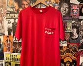 Vintage 1980s quot Enjoy Coke quot Coca Cola Red Nylon Jersey Double Sided Graphic Pocket Shirt