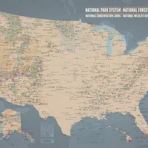 May include: A detailed map of the United States, showcasing national parks, forests, conservation lands, and wildlife refuges. The map is in shades of tan, brown, and green, with blue representing water bodies. Text at the top indicates the map's focus on protected areas.