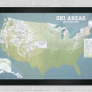 May include: Framed map of the United States with the text "SKI AREAS of the United States". The map is in shades of green, blue, and tan, with small icons indicating ski areas. The frame is black.