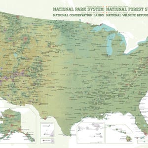 May include: A detailed map of the United States, highlighting national parks, forests, conservation lands, and wildlife refuges. The map is predominantly green with various markers and text indicating locations and designations. The title reads "National Park System".