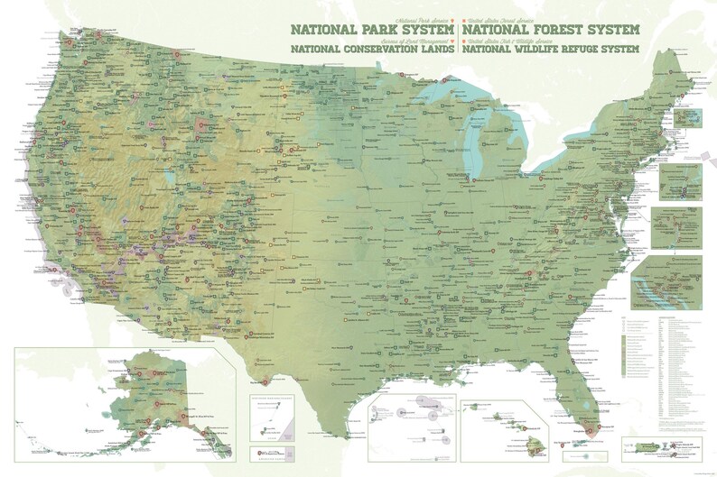 May include: A detailed map of the United States, highlighting national parks, forests, conservation lands, and wildlife refuges. The map is predominantly green with various markers and text indicating locations and designations. The title reads "National Park System".