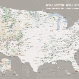 May include: A detailed map of the United States, highlighting national parks, forests, conservation lands, and wildlife refuges. The map features a neutral color palette with green and brown accents, and includes text labels for each location. The map is a visual guide to the country's protected areas.