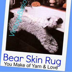 May include: A handmade bear skin rug made of yarn, with a white fluffy body and black accents for the eyes and nose. The rug is displayed in a bathroom setting, with the text "Bear Skin Rug" and "You Make of Yarn & Love".