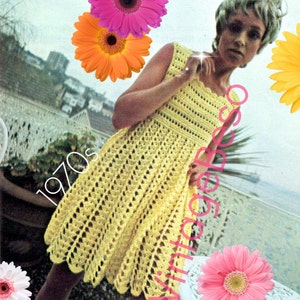 May include: A yellow crochet dress with a scalloped hem. The dress is sleeveless and has a simple, square neckline. The model is wearing the dress with her hair styled in a short, bobbed cut. The image is set against a backdrop of a garden with flowers.